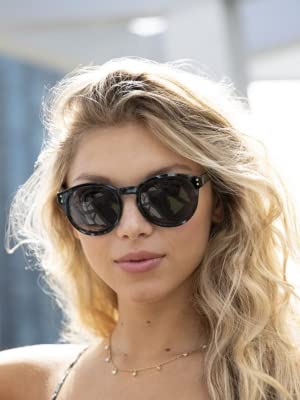 Female Model Wearing Foster Grant Sunglasses