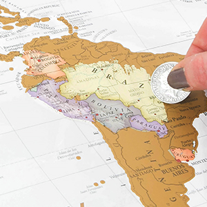 closeup of coin scratching map