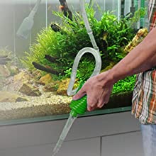 a man using the fish tank siphon blue