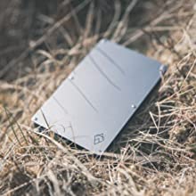 silver rfid credit card protector wallet on the ground