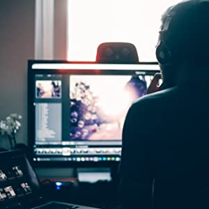 someone working on a desktop screen