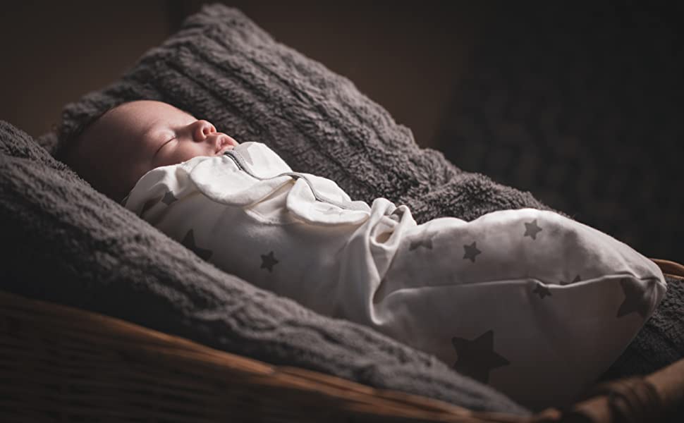 Baby asleep in swaddle