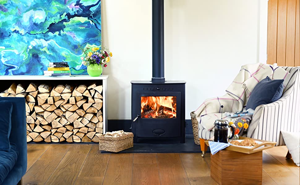 Picture of a wood burning stove with a fire inside. 