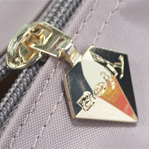 Zinc alloy zipper head