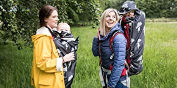 Silver lighting babywearing sling carrier cover on a front buckle carrier backpack carrier