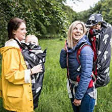 Silver lighting babywearing sling carrier cover on a front buckle carrier backpack carrier